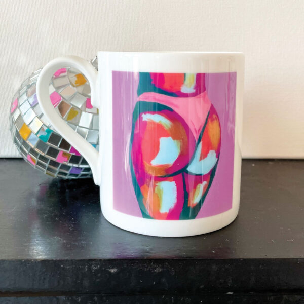 lilac china mug with bum painting and disco ball to side